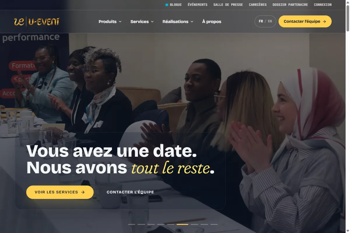 The U-EVENT homepage — dark hero with warm gold accents